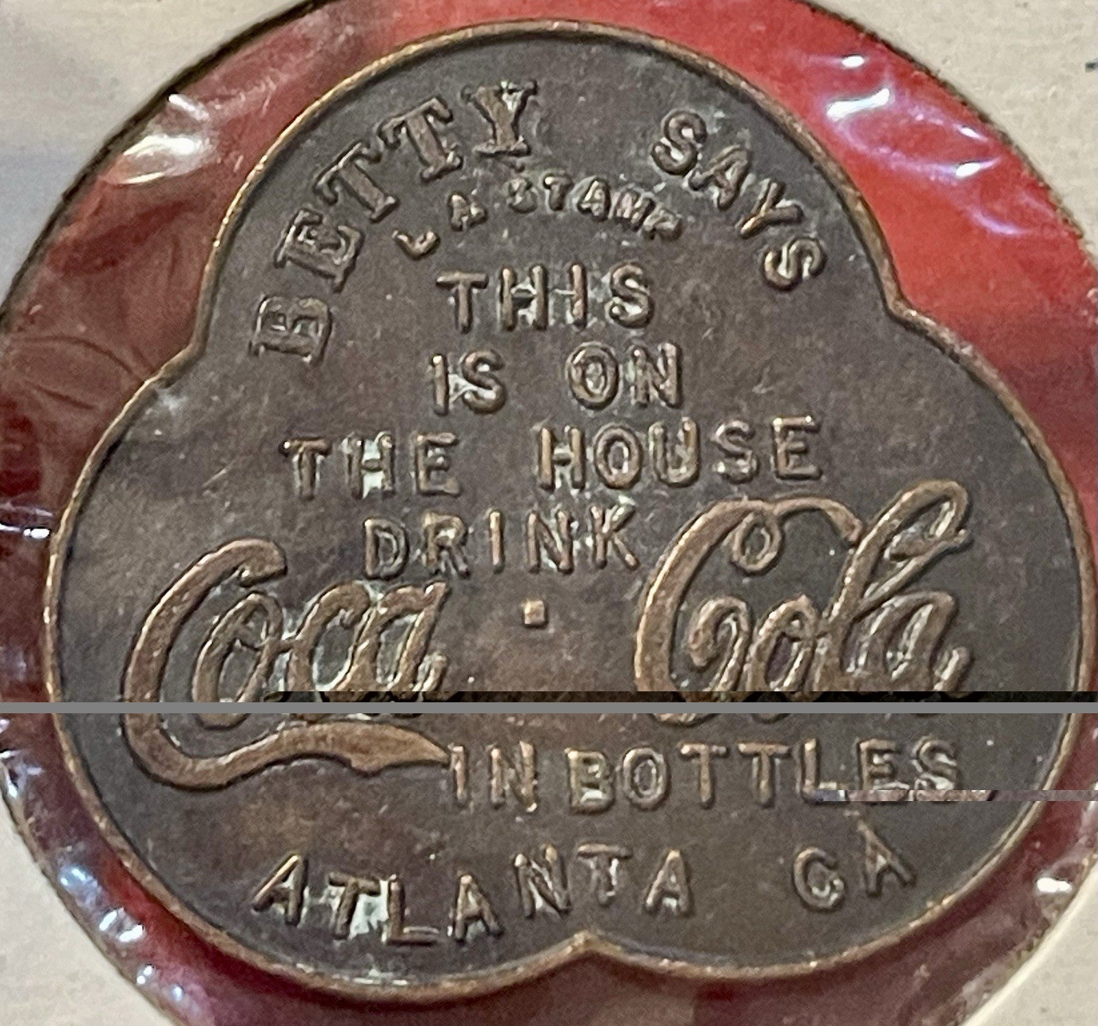 Vintage metal Betty Says Drink Coca-Cola Free Bottle TOKEN L.A. Stamp Coke