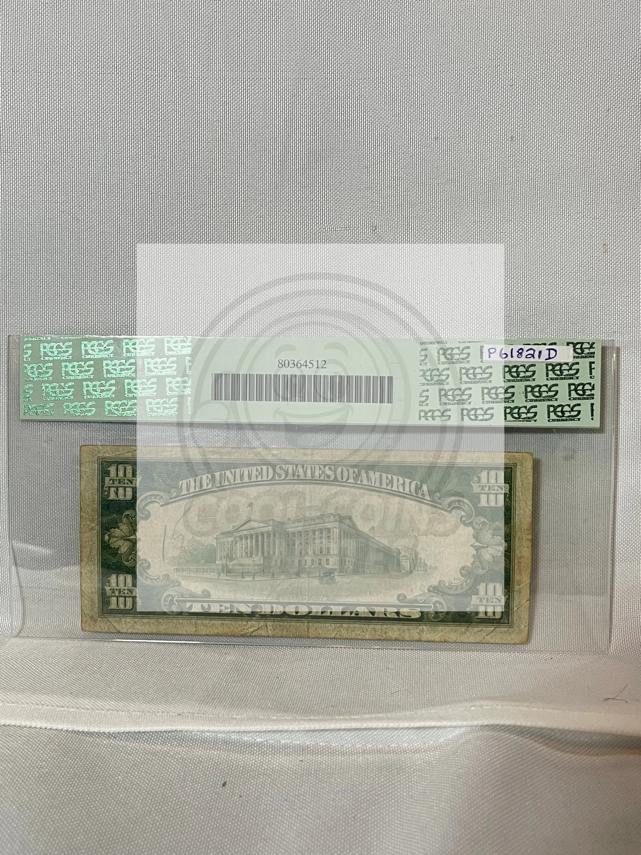 1934A North Africa Silver Certificate $10 graded PCGS Fine with yellow Treasury seal and WWII design elements