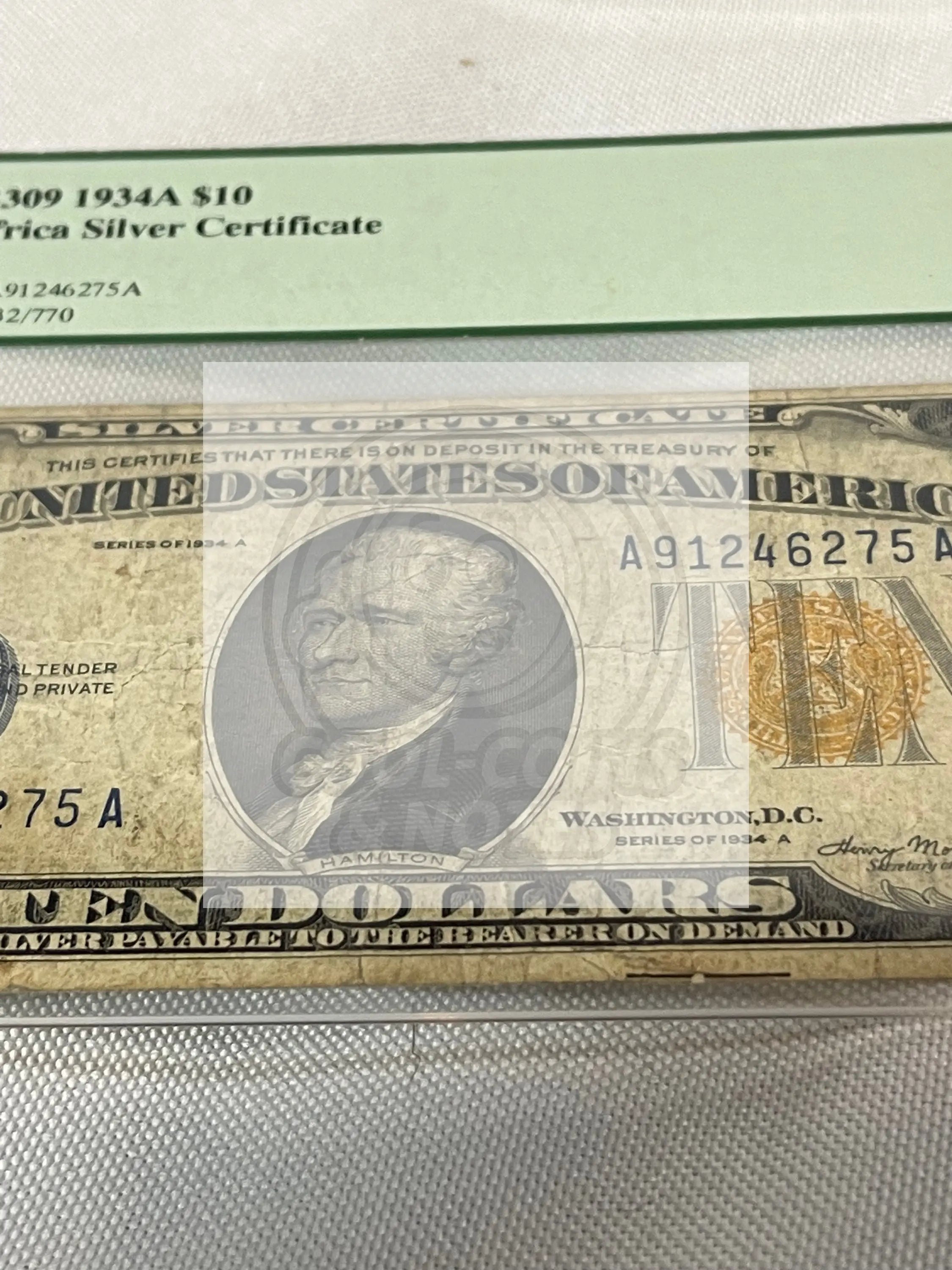 1934A North Africa Silver Certificate $10 U.S. currency note graded PCGS Fine with yellow Treasury seal and WWII military design