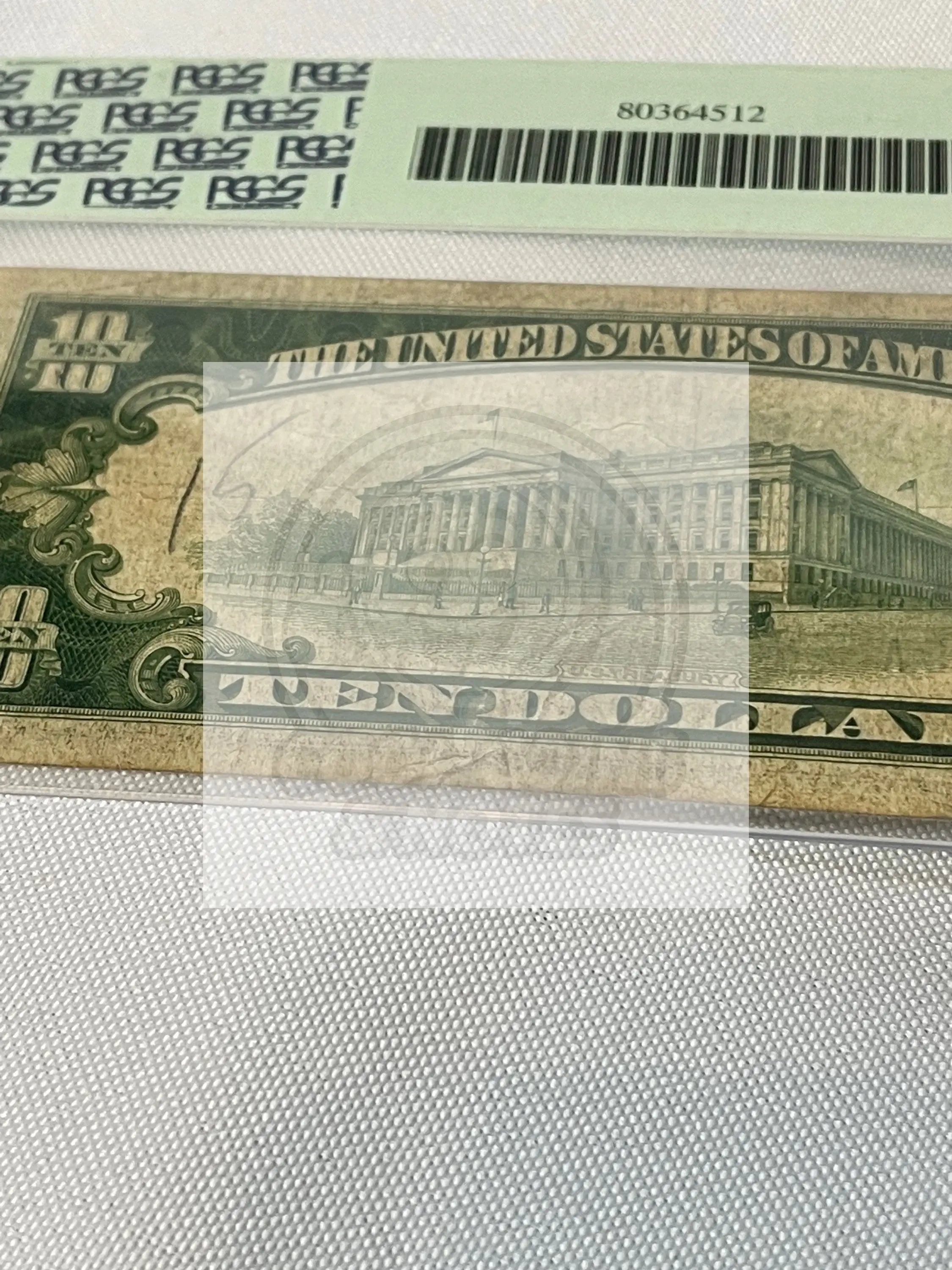 1934A North Africa Silver Certificate $10 graded PCGS Fine with yellow Treasury seal and WWII design elements