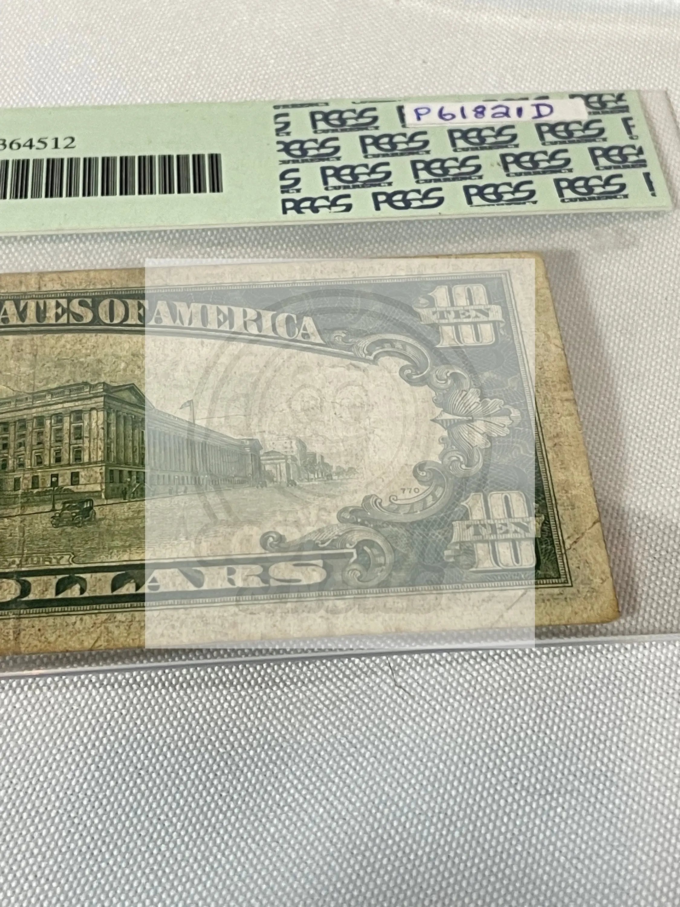 1934A North Africa Silver Certificate $10 note graded PCGS Fine with yellow Treasury seal and wartime design features
