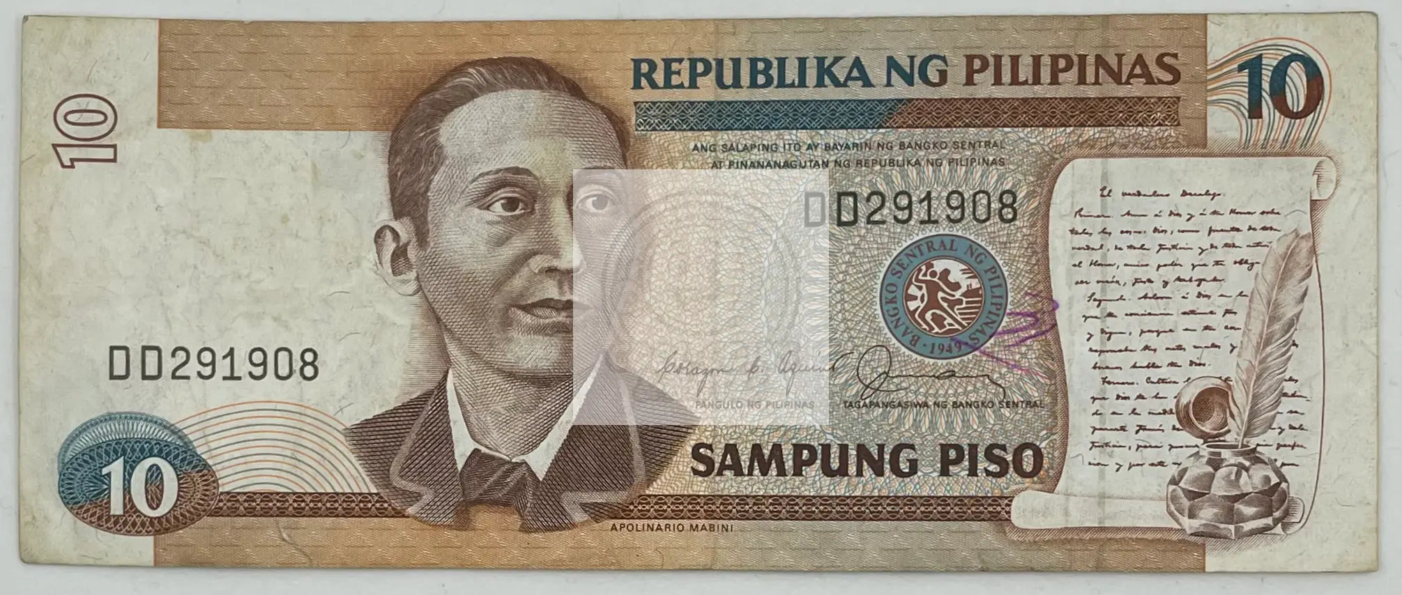 1990 Philippines 10 Piso banknote featuring Apolinario Mabini and Barasoain Church in circulated condition
