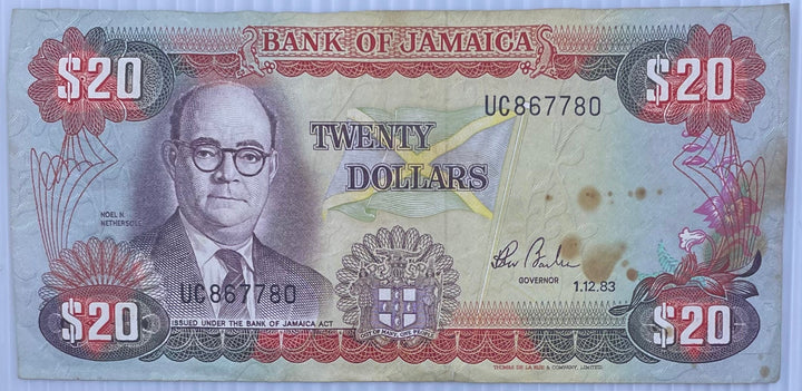 1983 Jamaica $20 Dollars banknote featuring Marcus Garvey and Dunn's River Falls in uncirculated condition