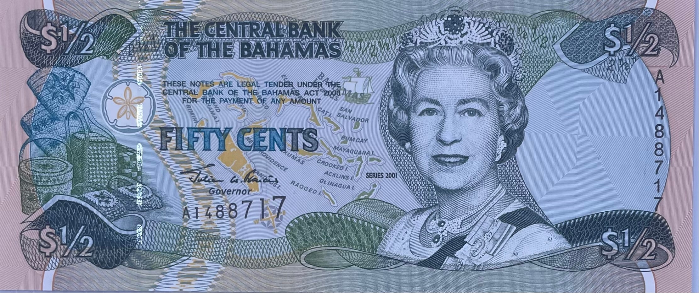 2001 Bahamas 1/2 Dollar banknote featuring Queen Elizabeth II in uncirculated condition with Bahamian motifs