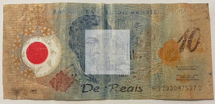 Brazil 2000 10 Reais polymer banknote featuring Republica effigy and Brazilian macaw design