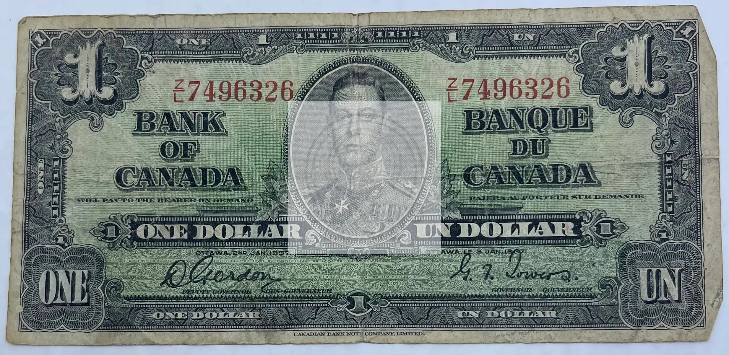 Canada 1937 $1 banknote featuring King George VI portrait and vintage Canadian currency design