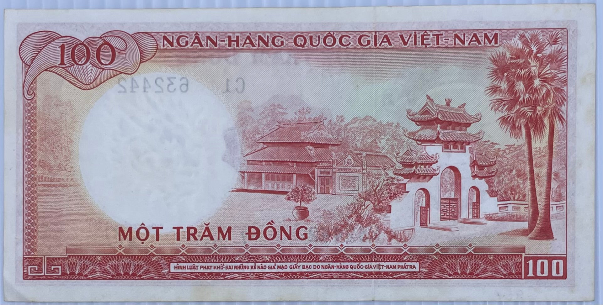 Vietnam 1966 100 Dong P-19b used banknote showing wear and circulation marks