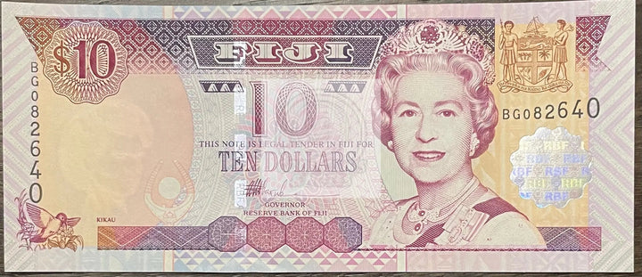Fiji 10 Dollars 2002 banknote featuring Queen Elizabeth II and Fijian cultural designs in UNC condition