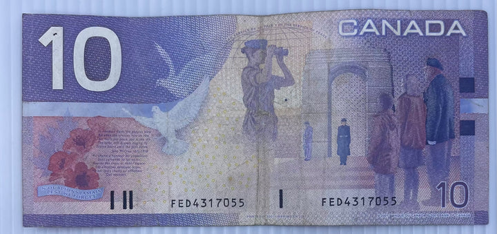 Canada 2001 $10 polymer banknote featuring Queen Elizabeth II and Canadian landscapes