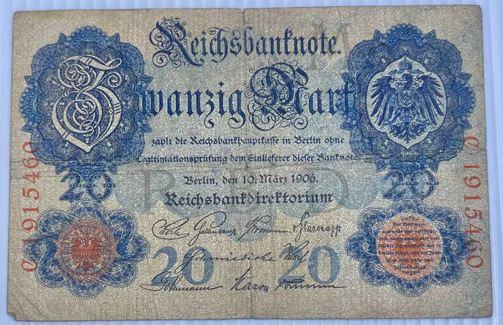 Used Germany 20 Mark banknote from 1914 with intricate engravings and historical design