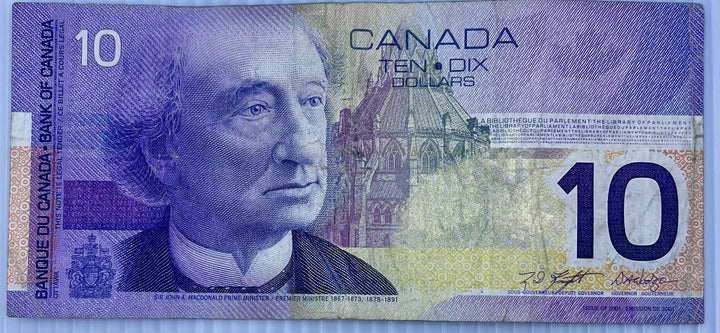 Canada 2001 $10 polymer banknote featuring Queen Elizabeth II and Canadian landscapes