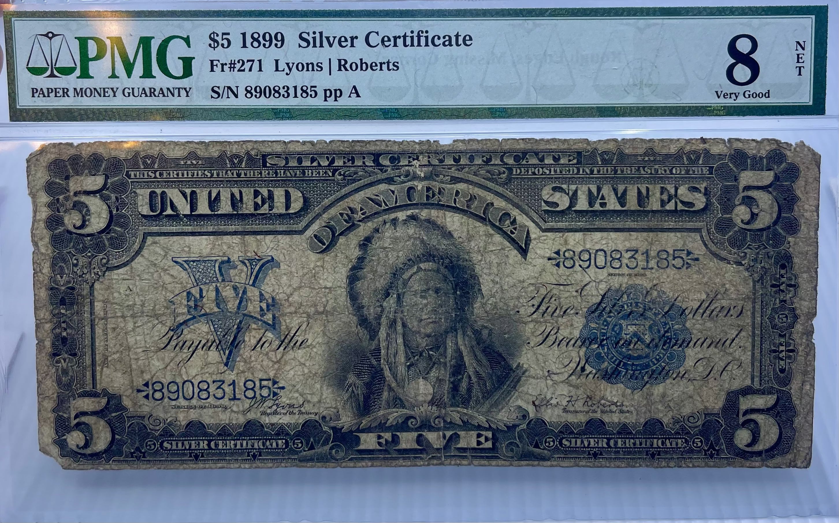 1899 $5 Silver Certificate "Chief" note with Native American portrait, PMG 8 NET graded, rough edges, missing corner