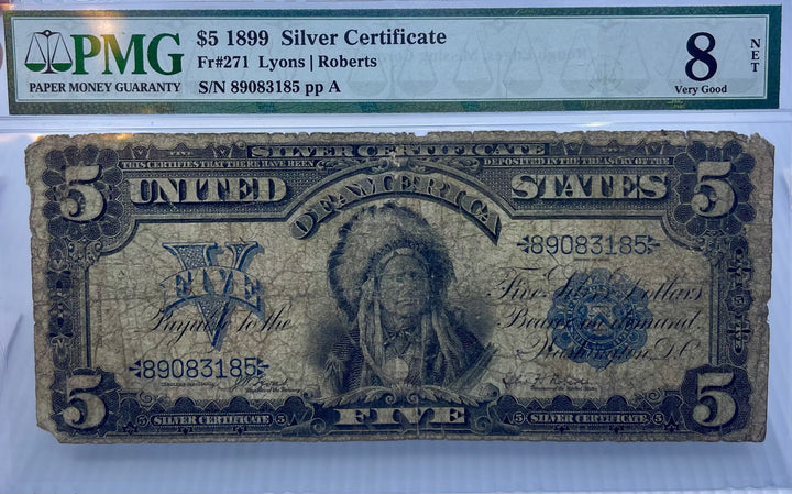 1899 $5 Silver Certificate "Chief" note with Native American portrait, PMG 8 NET graded, rough edges, missing corner