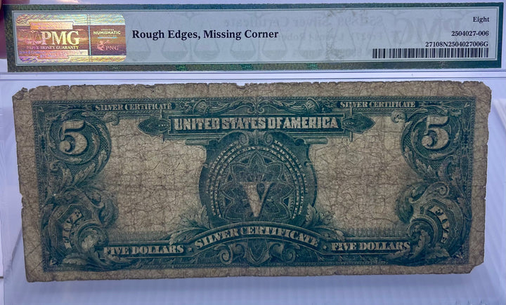 1899 $5 Silver Certificate Chief note with Native American portrait, PMG 8 NET graded, blue Treasury seal, rough edges, missing corner