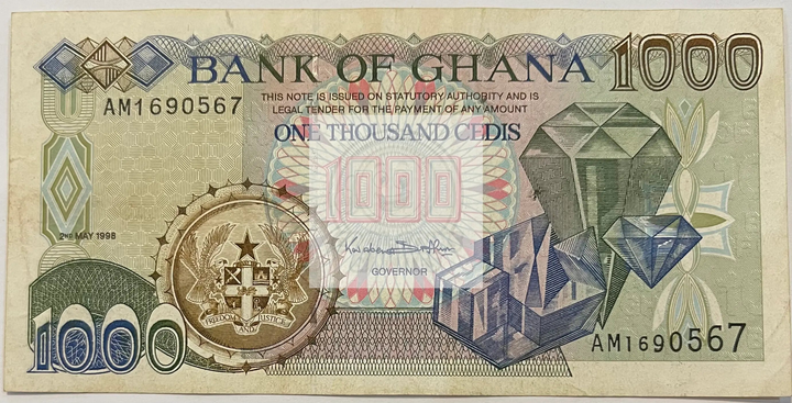 1986 Ghana 100 Cedis banknote featuring Kwame Nkrumah portrait and Akosombo Dam illustration