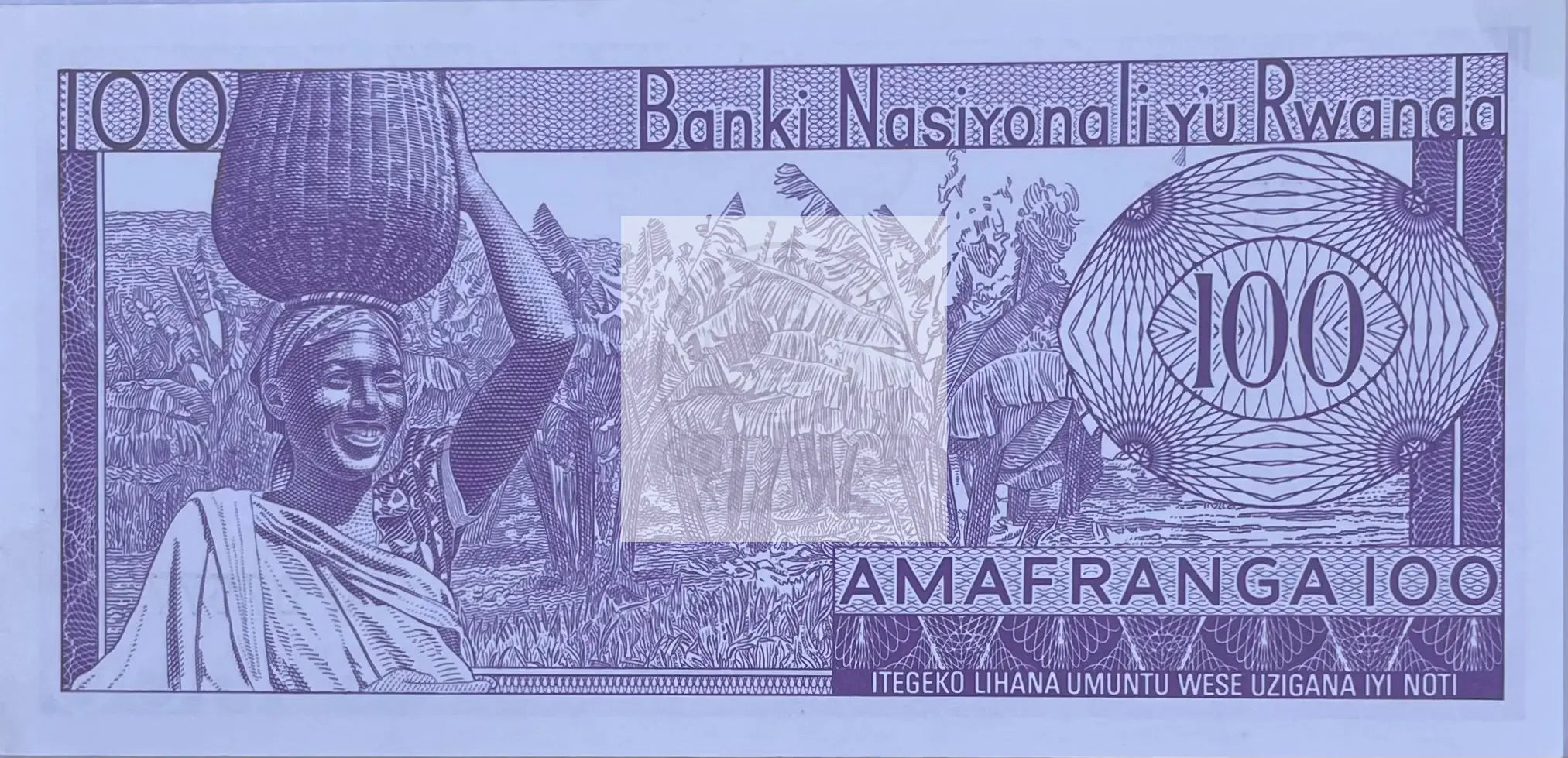 Rwanda 100 Francs 1976 banknote with traditional Rwandan women portrait and farmers scene in UNC condition