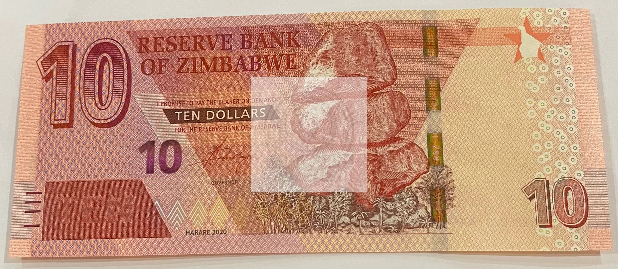 Zimbabwe 10 Dollars Banknote 2020 P-103 featuring Chiremba Balancing Rocks and Victoria Falls in uncirculated condition